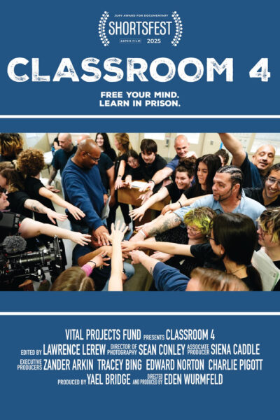 This is a film poster for "Classroom 4," a documentary featured at Aspen Film ShortsFest 2025. The tagline "Free your mind. Learn in prison." appears under the bold title. The central image shows a diverse group of people standing in a circle, energetically reaching their hands inward for a gesture of unity and support. Production and creative credits are listed at the bottom, including producers, editors, and director Eden Wurmfeld. The film is presented by Vital Projects Fund.