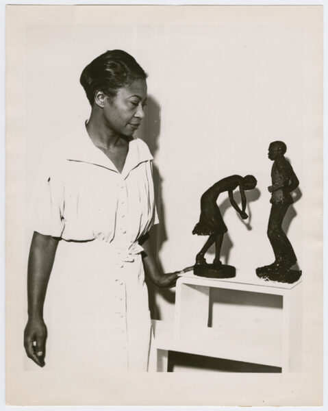 SFAS_03_Augusta_Savage_with_sculptures_Susie_Q_and_Truckin_NYPL_1939
