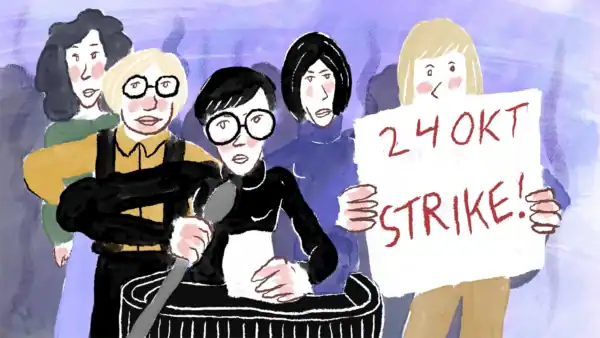Four people stand together; one speaks into a microphone, while another holds a sign that reads "24 Oct STRIKE!" in red letters.