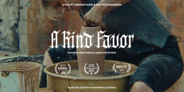 A film poster shows a close-up of hands shaping a clay vase on a pottery wheel, with earthy textures and tones in the background. The title "A Kind Favor" is displayed in bold, stylized lettering across the vase, along with credits for the filmmakers Christian Klein & Mattias Evangelista, and featured cast Jessie Dubois & Marcia McDougal. The poster notes the film is shot on location in Davenport, California.
